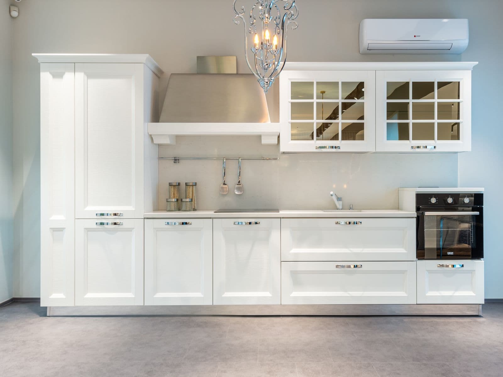 White shaker cabinets after professional refinishing