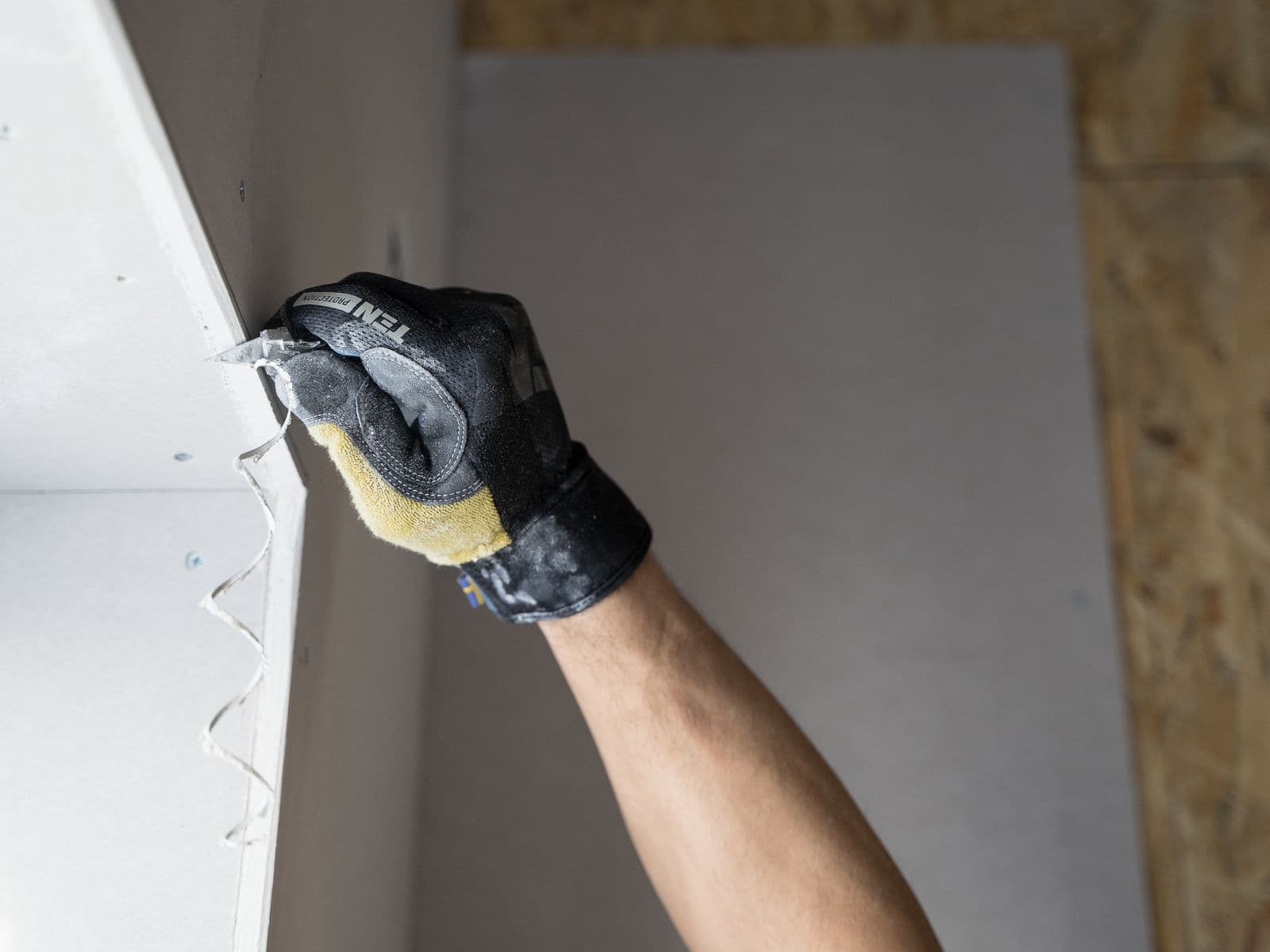 Trimming a drywall edge clean