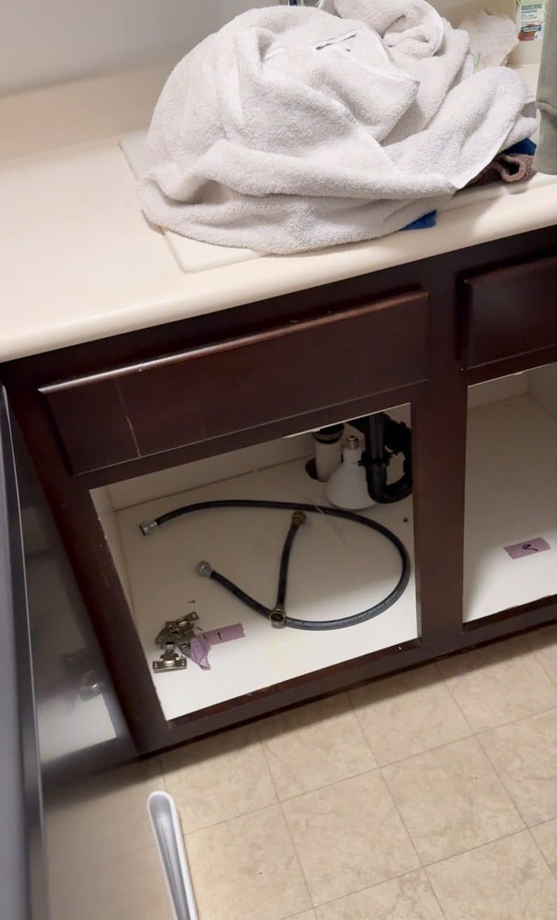 Laundry room cabinets before refinishing