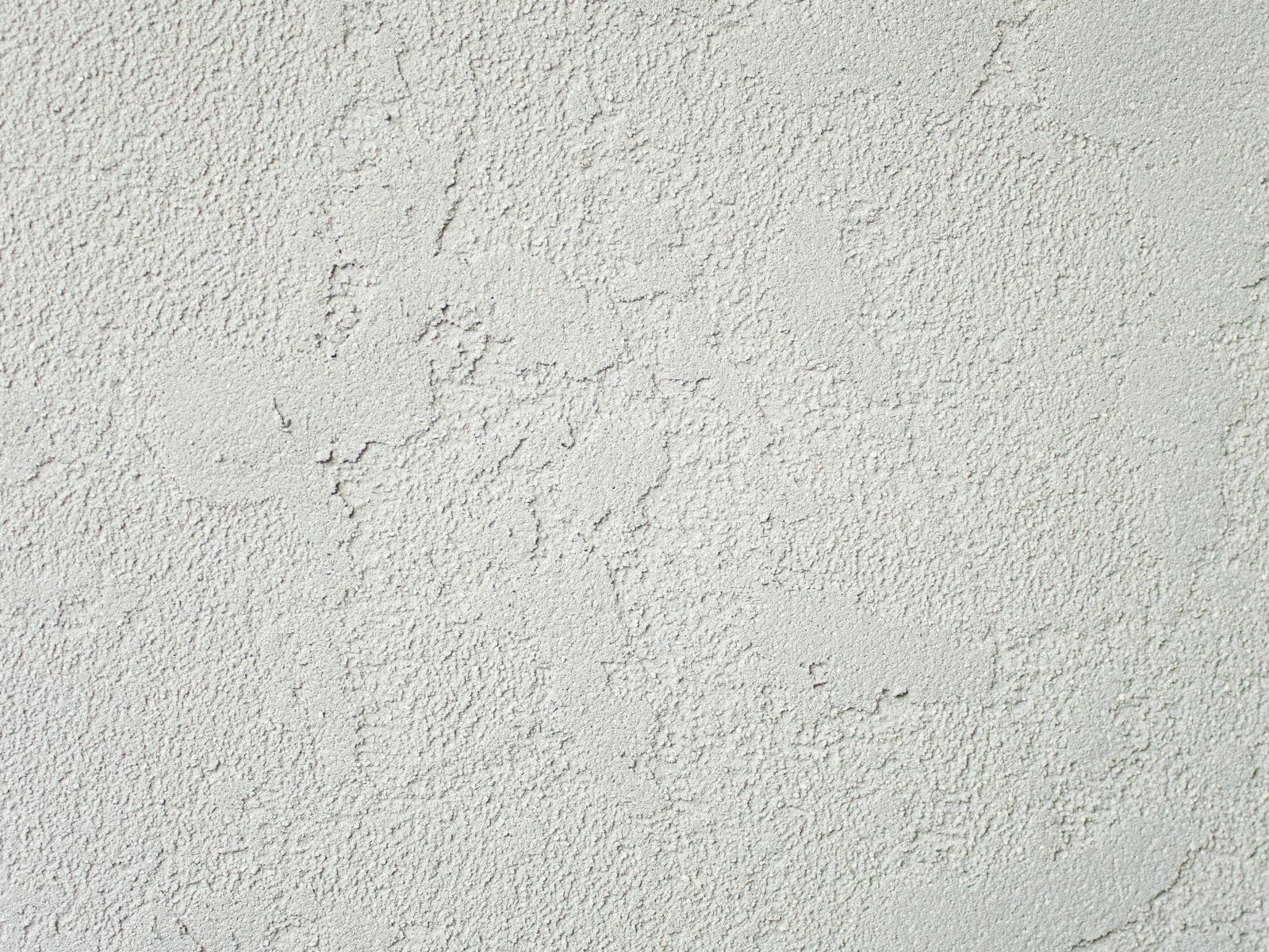 Stucco surface repaired and refinished