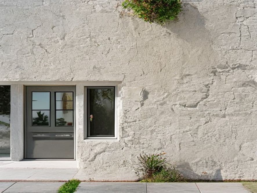 Detail of repaired stucco wall in San Diego