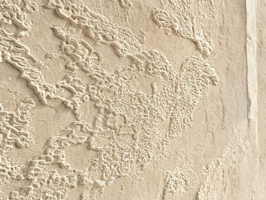 Close-up of textured lace stucco wall