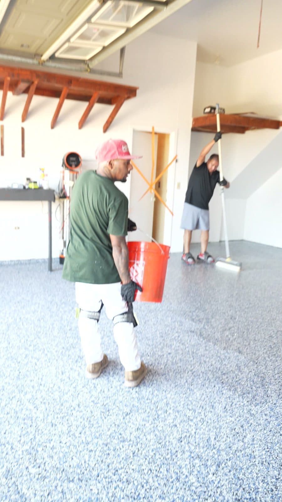 Broadcasting color flake by hand across the wet base coat