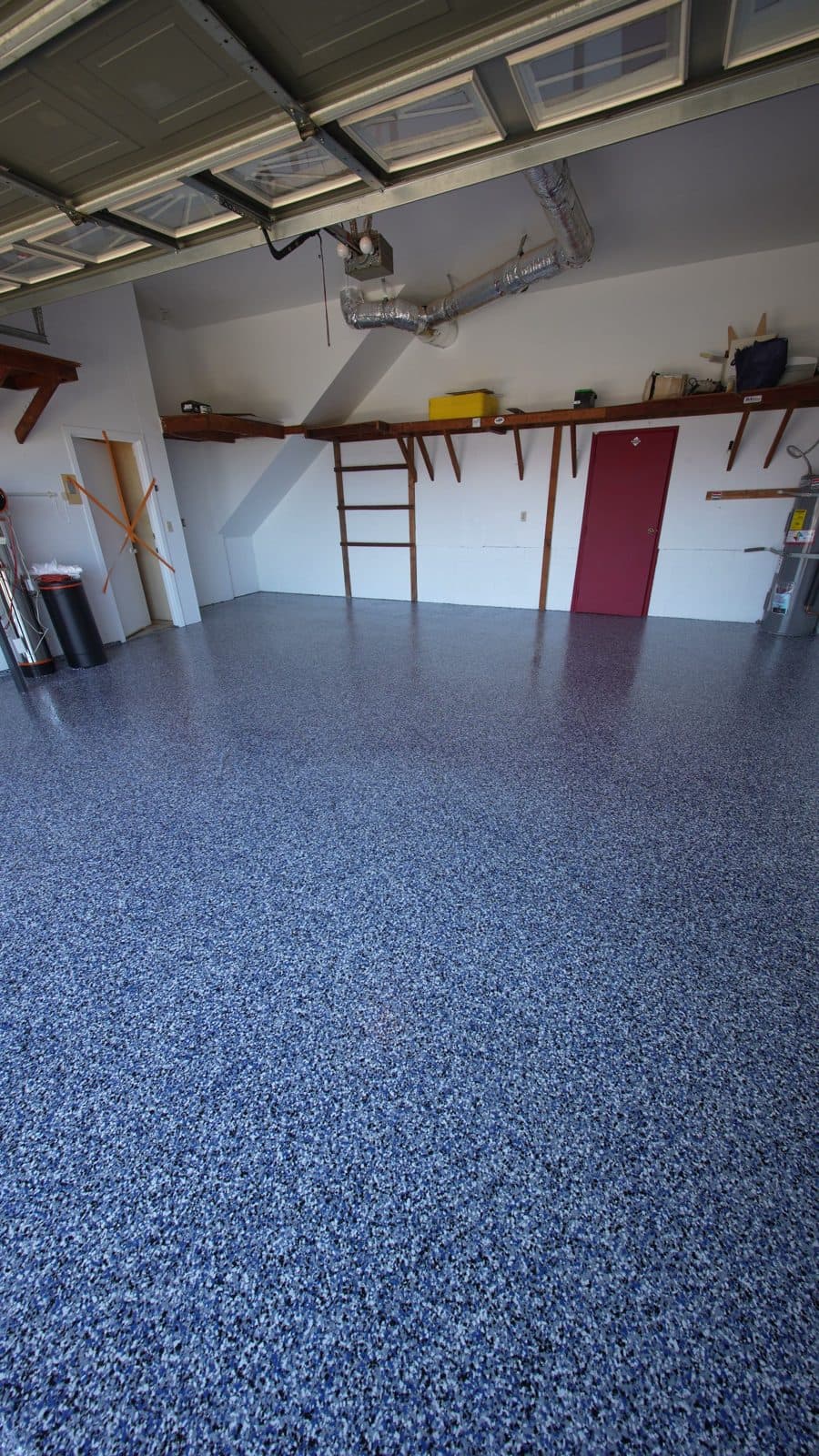 Flake epoxy garage floor with the garage door open